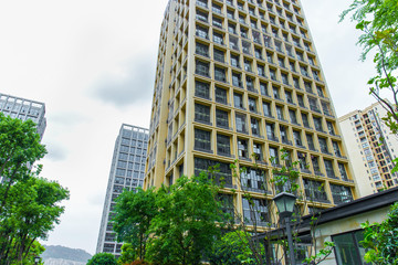 Looking up at the high-rise residential buildings in the city