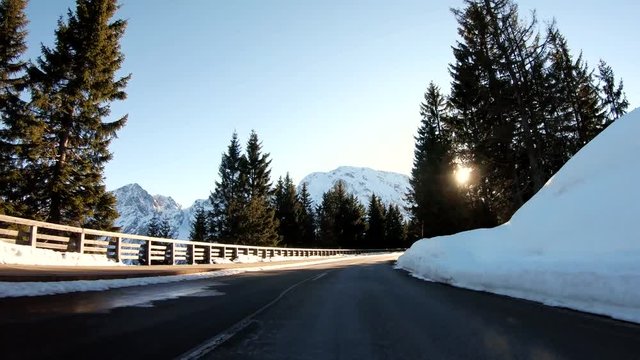 POV driving in the dazzling sun in winter