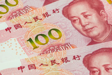 Yuan notes from China's currency. Chinese currency close up as background.