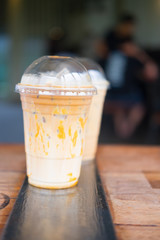 Iced caramel macciato coffee with milk