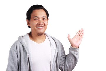 Young Man Showing Something on Empty Hand gesture