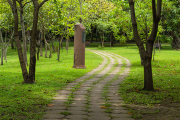 Cement block floor a walk on the lawn.