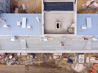 urban building site. new roof under construction. aerial top view