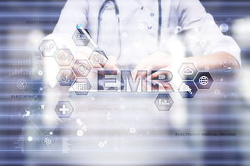 Electronic health record. EHR, EMR. Medicine and healthcare concept. Medical doctor working with modern pc.