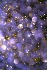 Purple and Gold Bokeh Light Background