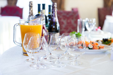 Wedding decorated table. Luxury light decor on table in restaurant	