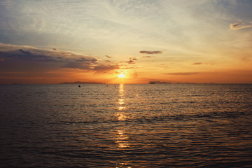 Fototapeta premium Beautiful sunset on the beach and sea at Koh-Samui in Surat Thani Province, Thailand