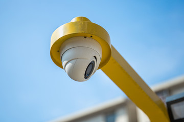 a round surveillance camera close-up