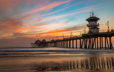 Fototapeta premium Sunset by the Huntington Beach Pier in California