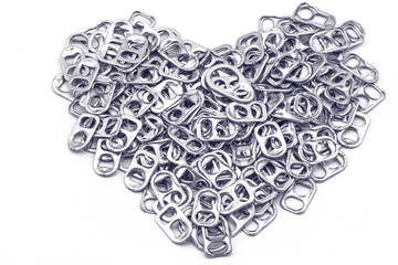 Ring pull aluminum of cans stack as heart shape indicate of new hope on white background,processed...