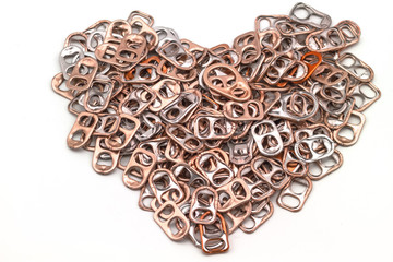 Ring pull aluminum of cans stack as heart shape indicate of new hope on white background
