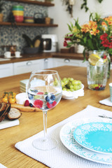 Close up of fresh and healthy summer breakfast in Mediterranean style kitchen.  