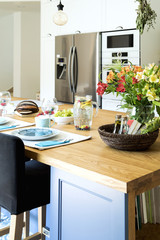 Close up of fresh and healthy summer breakfast in Mediterranean style kitchen.  