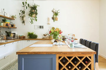 Fresh summer breakfast in Mediterranean style kitchen.  Bright and sunny space with a lot of herbs...