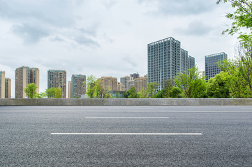 Modern city and asphalt highway