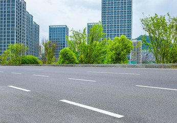 Modern city and asphalt highway