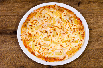 Pineapple pizza with cheese