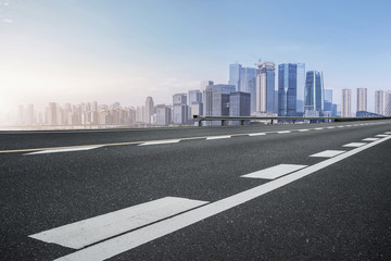 Fototapeta premium Road surface and skyline of Chongqing urban construction