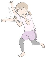 シャドーボクシングをする女性