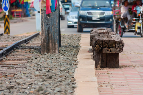 Wood bench with railway in city