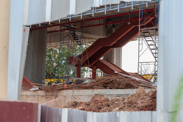 metal sheet channel look trough steel ladder of sky-train site