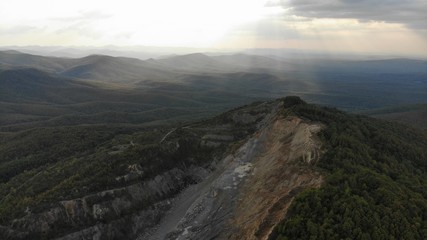 Fototapeta premium Beautiful view of the mountain peak on the sunset.