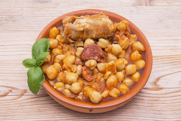casserole of stewed chickpeas with meat and chorizo