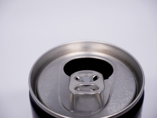 closeup opened can on white background