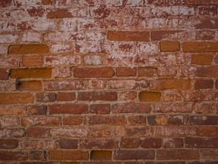 The texture of the old red brick wall.
