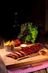 BBQ spare ribs from a charcoal grill