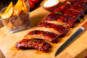 BBQ spare ribs from a charcoal grill