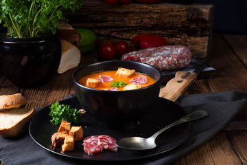 Hungarian paprika cream soup with spicy sausage
