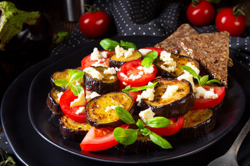 Eggplant grilled with aromatic feta cheese and tomatoes