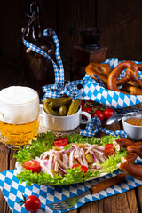 delicious bavarian sausage salad with onion and cucumbers