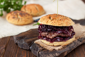 Gluten free burger with caramelized onions