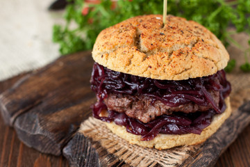 Gluten free burger with caramelized onions