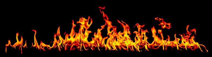 Fototapeta premium Fire flames on black background