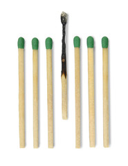 Seven matches one burned. Image concept