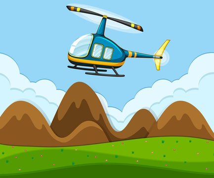A helicopter flying above the ground