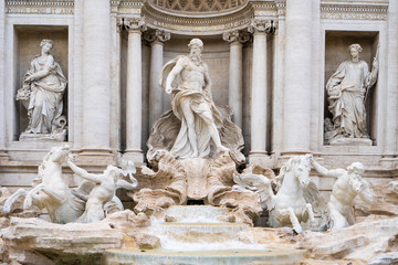 Fototapeta na wymiar The Trevi fountain with Oceanus, god of the sea, in the center in Rome, Italy