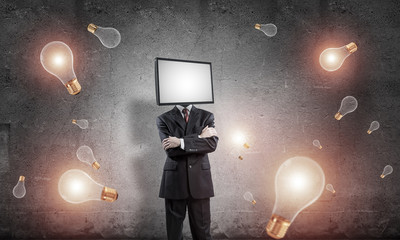 Businessman with TV instead of head.