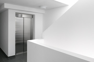 European modern stainless steel elevator , New lift in an apartment building - 219639302