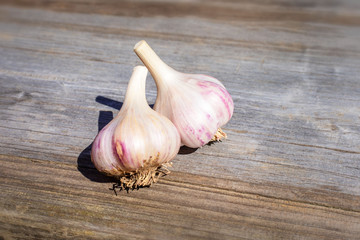 garlic on wood surface