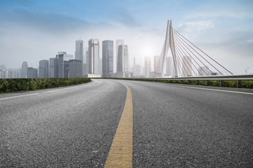 Naklejka premium Road surface and skyline of Chongqing urban construction
