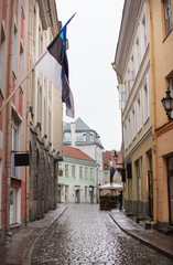 Narrow street in the old town in Tallinn Estonia in a rainy day