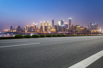 Fototapeta na wymiar Road surface and skyline of Chongqing urban construction