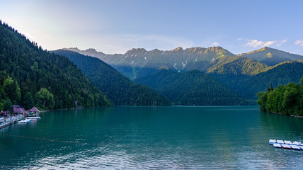 Beautiful mountain Lake Ritsa. Lake Ritsa in the Caucasus Mountains, in the north-western part of Abkhazia, Georgia, surrounded by mixed mountain forests and subalpine meadows.