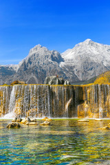 China's Lijiang Jade Dragon Snow Mountain and lakes and waterfalls at the foot of the mountain