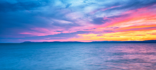 Naklejka na ściany i meble Colorful sunset over lake Balaton