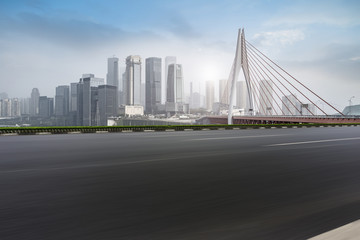 Fototapeta premium Road surface and skyline of Chongqing urban construction